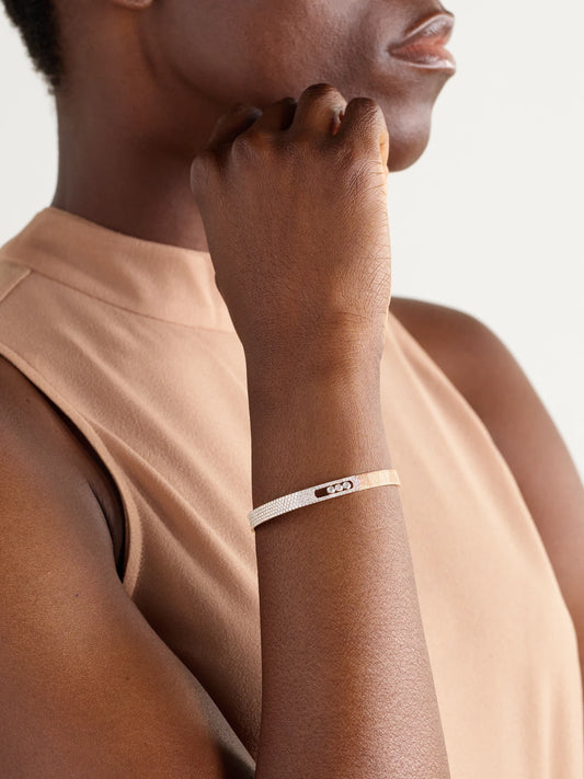 Image of Bracelets. Product name - Move Noa Ciselé 18-karat Rose Gold Diamond Bangle in Multi colour by brand - Messika
