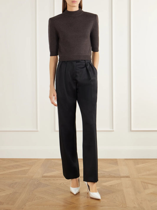 Image of a model wearing Outerwear. Product name - Chavela Cropped Wool Sweater in Brown colour by brand - Willy Chavarria