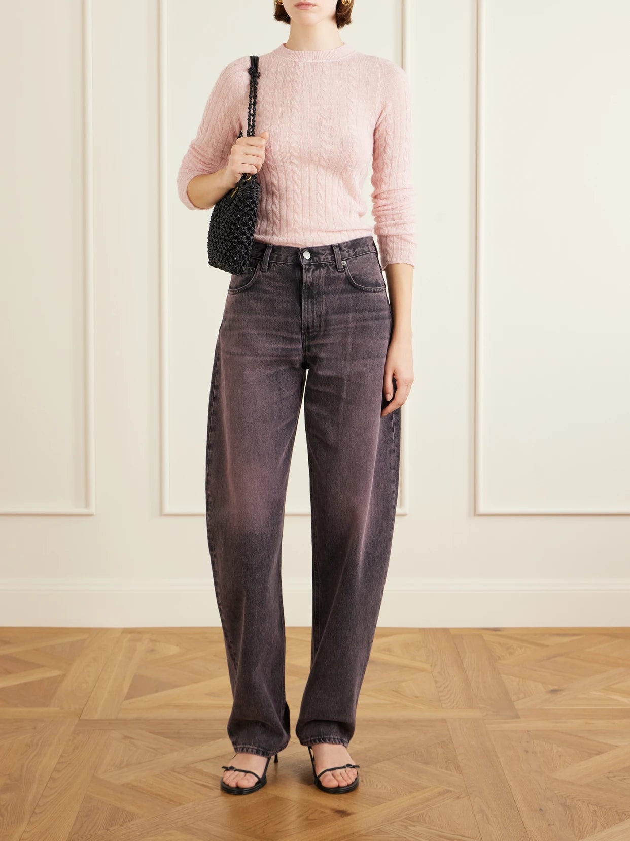 Image of a model wearing Outerwear. Product name - Sey Cable-knit Alpaca-blend Sweater in Pink colour by brand - Haikure