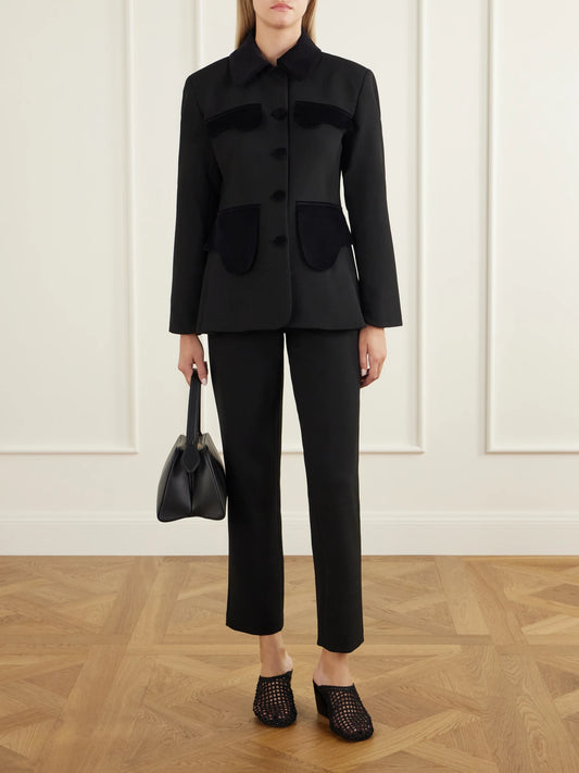 Image of a model wearing Pants. Product name - Tina Gallie Crepe Straight-leg Pants in Black colour by brand - DESTREE
