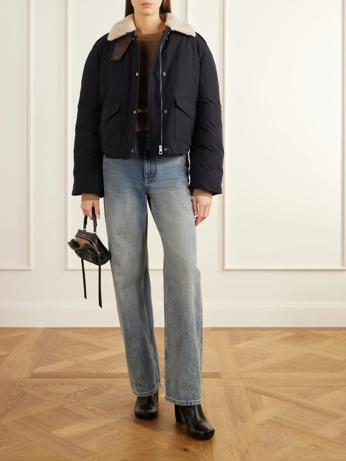 Image of Coats & Jackets. Product name - Padded Shearling-trimmed Cotton-blend Canvas Jacket in Black colour by brand - LOEWE