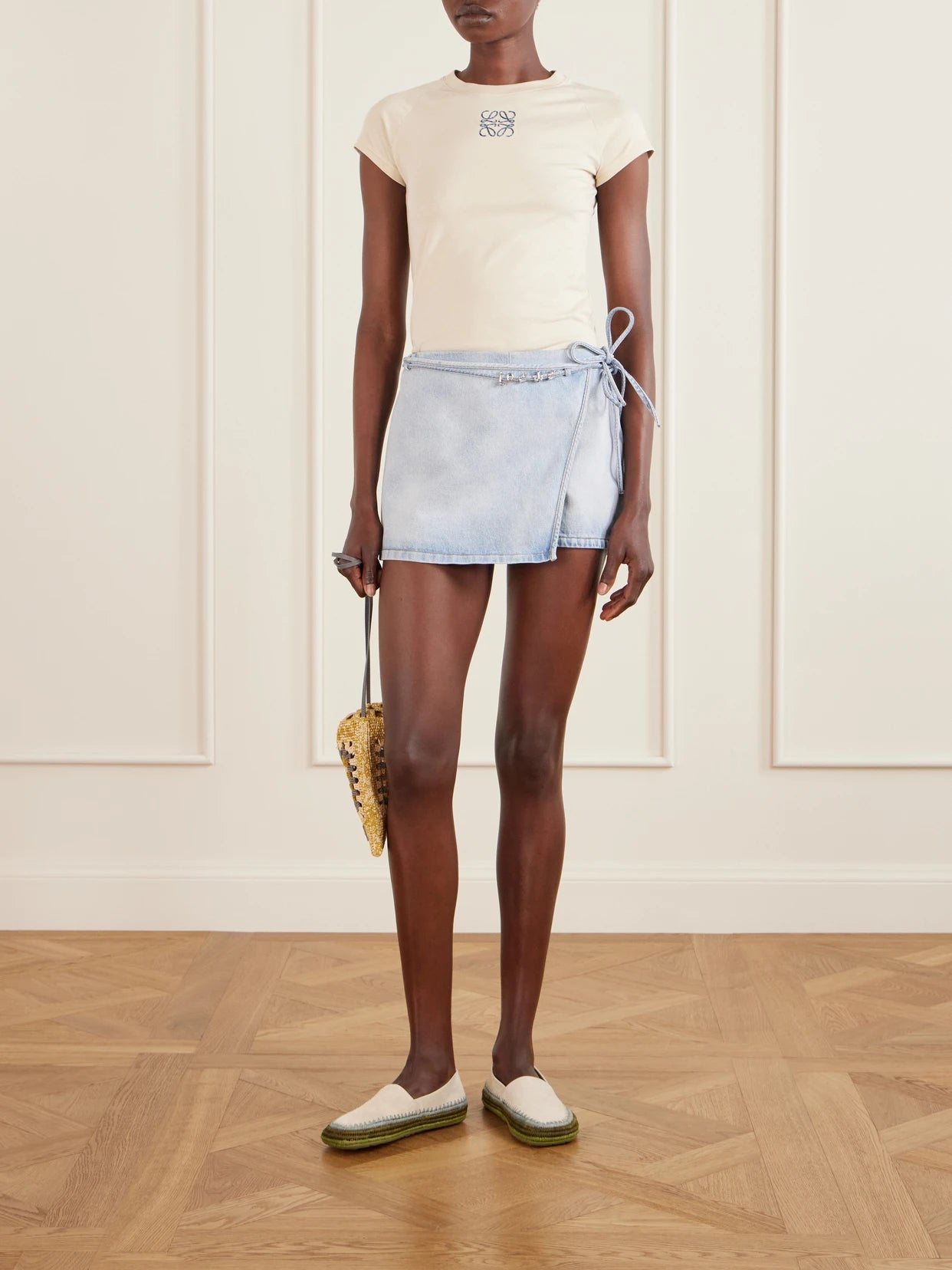 Image of a model wearing Shorts. Product name - + Paula's Ibiza Denim Shorts in Light denim colour by brand - LOEWE