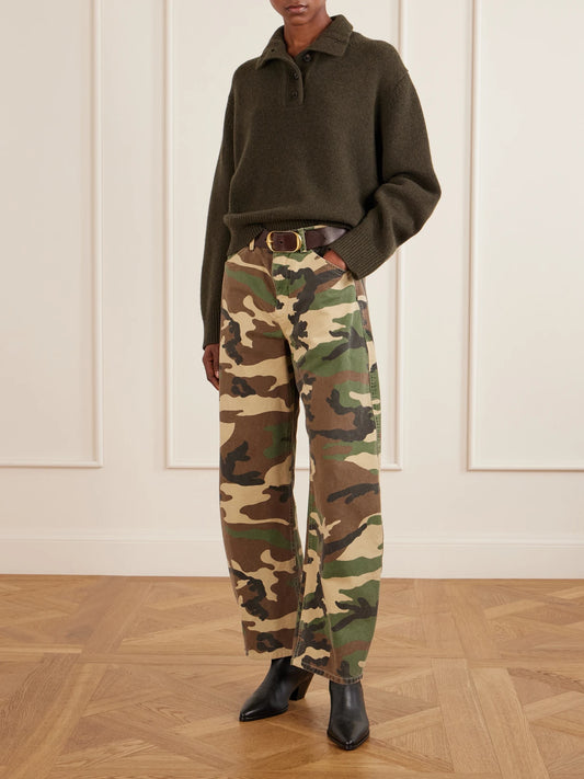 Image of a model wearing Outerwear. Product name - Renata Wool Sweater in Dark green colour by brand - Nili Lotan