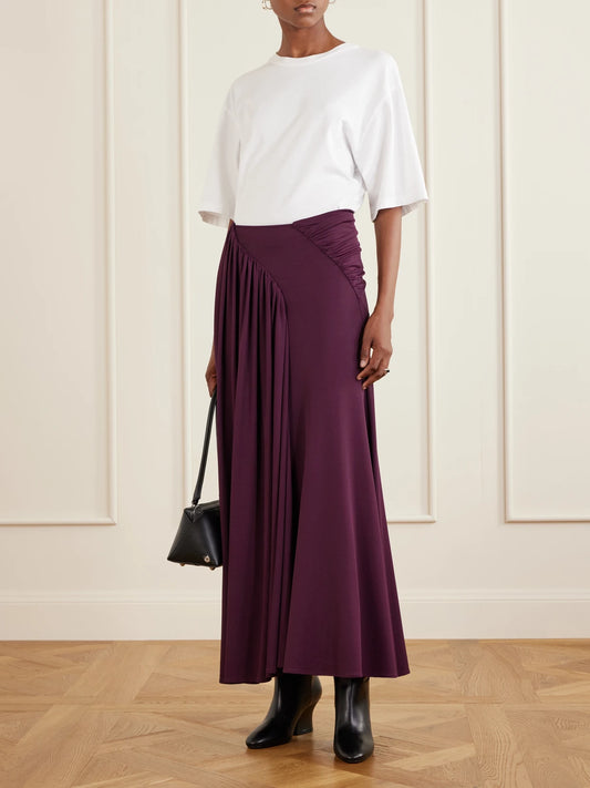 Image of a model wearing Skirts. Product name - Gathered Stretch-jersey Midi Skirt in Burgundy colour by brand - RABANNE