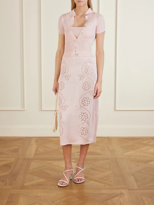 Image of a model wearing Tops. Product name - Stretch-knit Bralette in Pastel pink colour by brand - Calle Del Mar