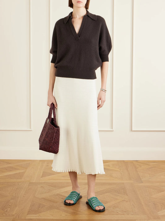 Image of a model wearing Outerwear. Product name - Vella Cashmere Polo Sweater in Brown colour by brand - Proenza Schouler