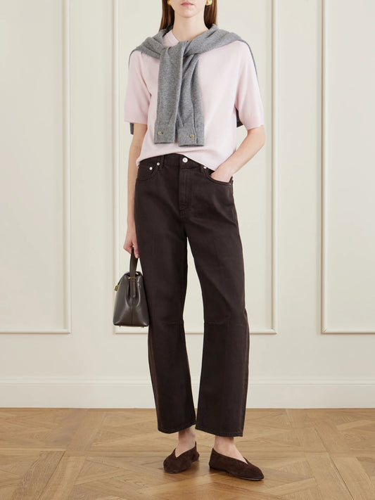 Image of a model wearing Outerwear. Product name - Kai Cashmere Sweater in Pastel pink colour by brand - Arch4