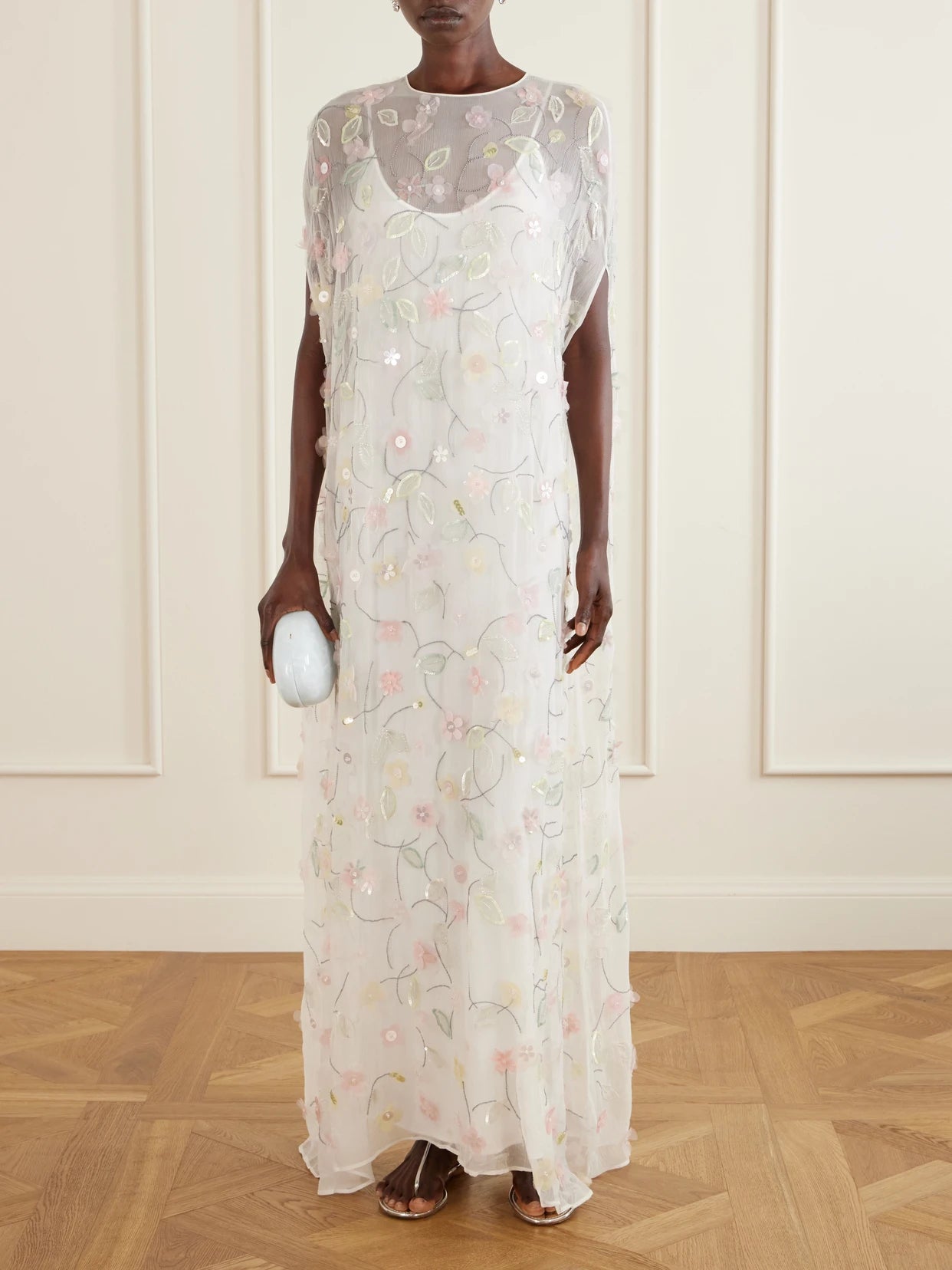 Image of Dresses. Product name - Embroidered Sequin-detailed Recycled Chiffon Gown in White colour by brand - BERNADETTE