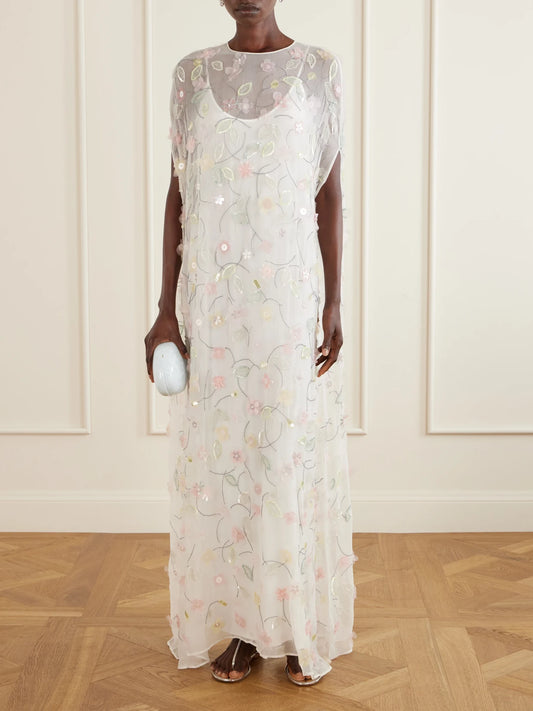 Image of Dresses. Product name - Embroidered Sequin-detailed Recycled Chiffon Gown in White colour by brand - BERNADETTE