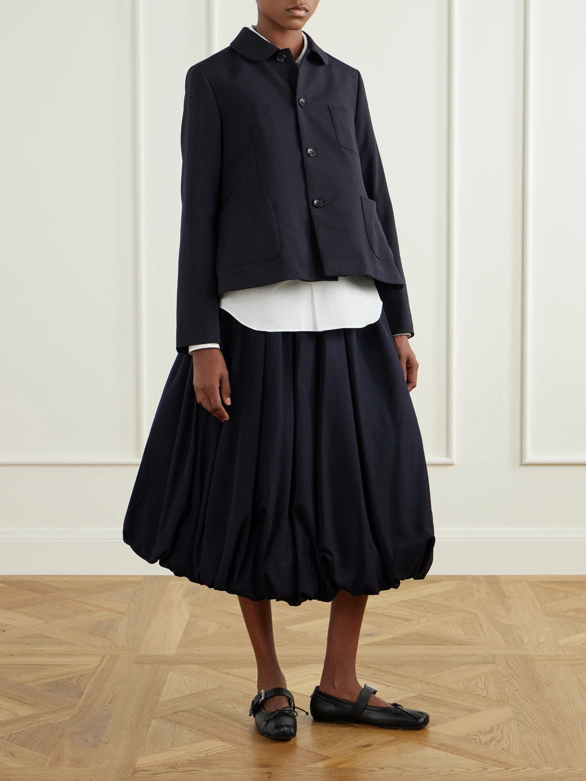 Image of a model wearing Tops. Product name - Ruffled Cotton-poplin Shirt in White colour by brand - Comme des Garçons GIRL