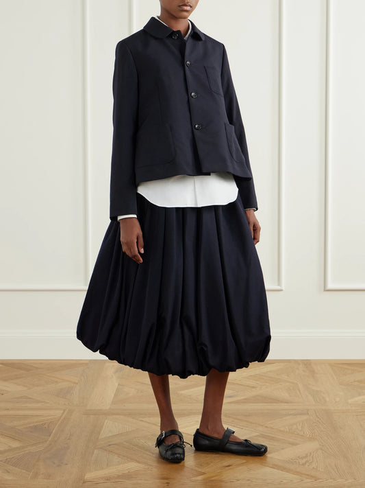 Image of a model wearing Tops. Product name - Ruffled Cotton-poplin Shirt in White colour by brand - Comme des Garçons GIRL