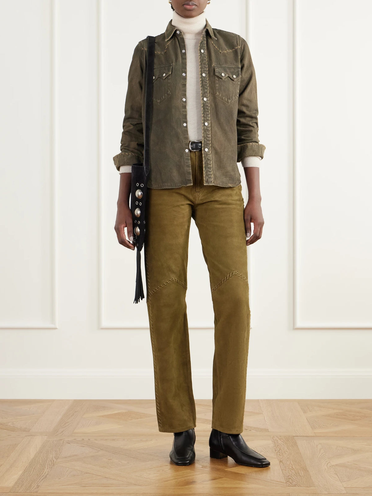 Image of a model wearing Tops. Product name - Whipstitched Denim Shirt in Brown colour by brand - RRL