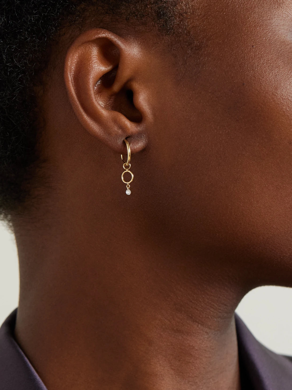 Image of Earrings. Product name - Circles 18-karat Gold Diamond Single Hoop Earring in Multi colour by brand - Persée
