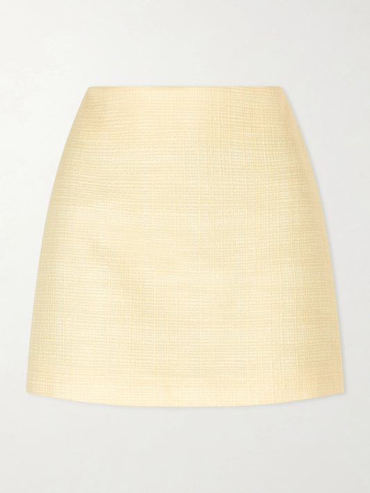 Image of a model wearing Skirts. Product name - Ourway Cotton‑blend Woven Mini Skirt in Yellow colour by brand - BLAZÉ Milano