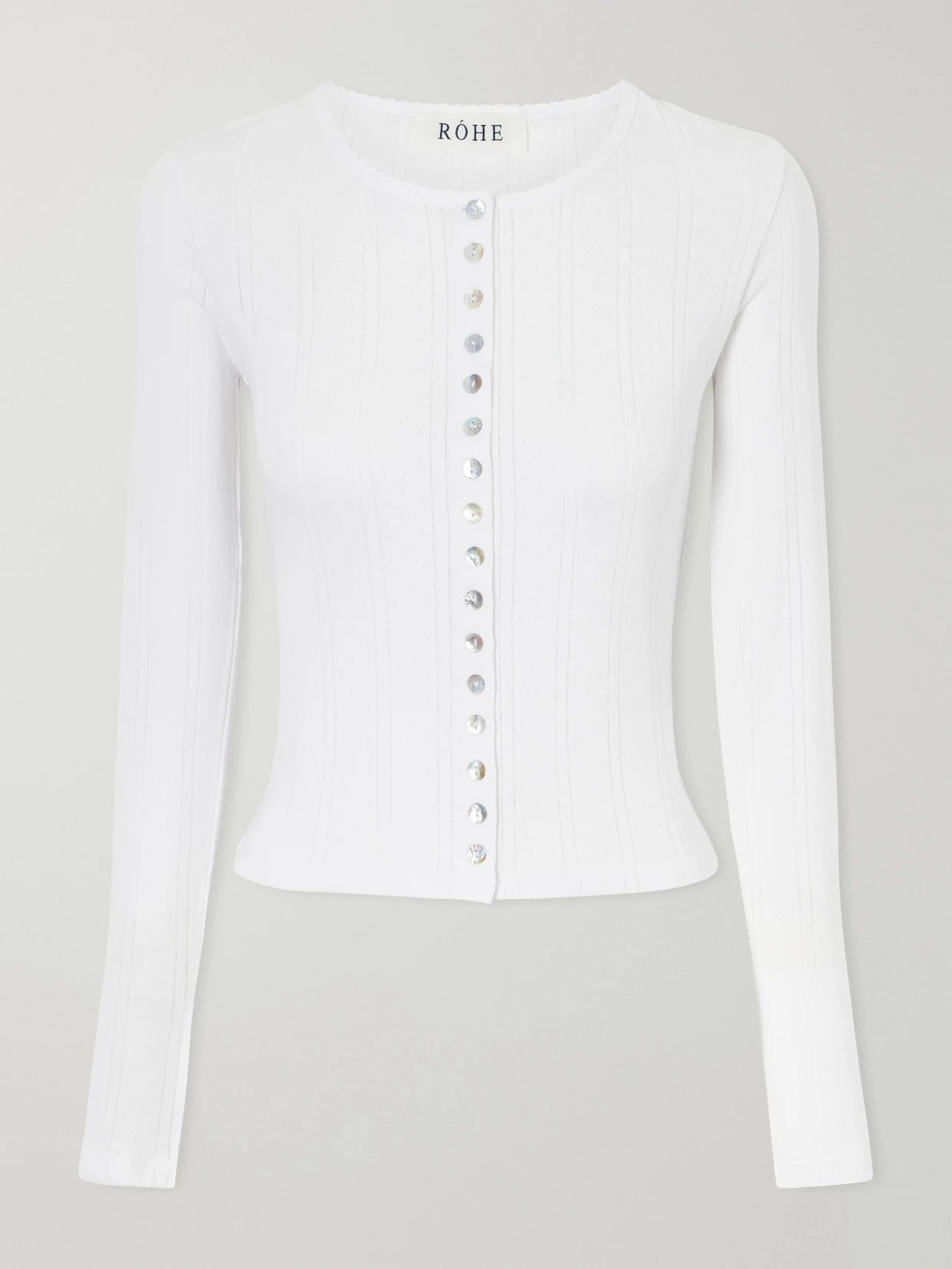 Image of a model wearing Tops. Product name - Pointelle-knit Cotton-jersey Cardigan in White colour by brand - RÓHE