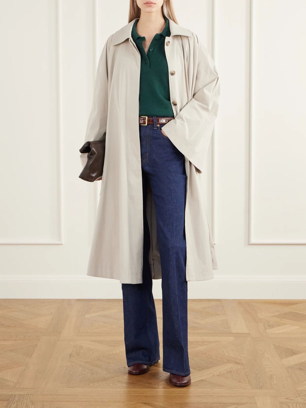 Image of a model wearing Outerwear. Product name - The Polo Cashmere Polo Sweater in Green colour by brand - Jamie Haller