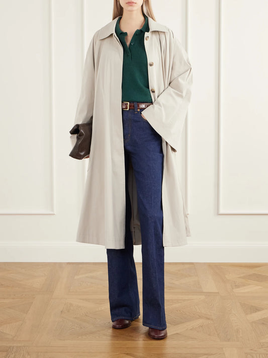 Image of a model wearing Outerwear. Product name - The Polo Cashmere Polo Sweater in Green colour by brand - Jamie Haller