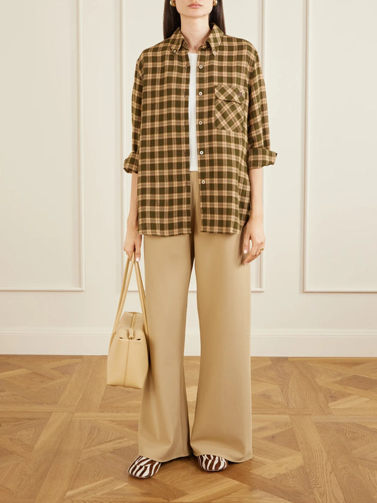 Image of a model wearing Tops. Product name - Ritual Checked Flannel Shirt in Brown colour by brand - Wales Bonner