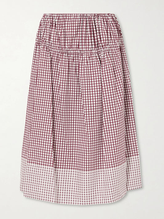 Image of a model wearing Skirts. Product name - Eve Tiered Checked Cotton Midi Skirt in Burgundy colour by brand - LIBEROWE