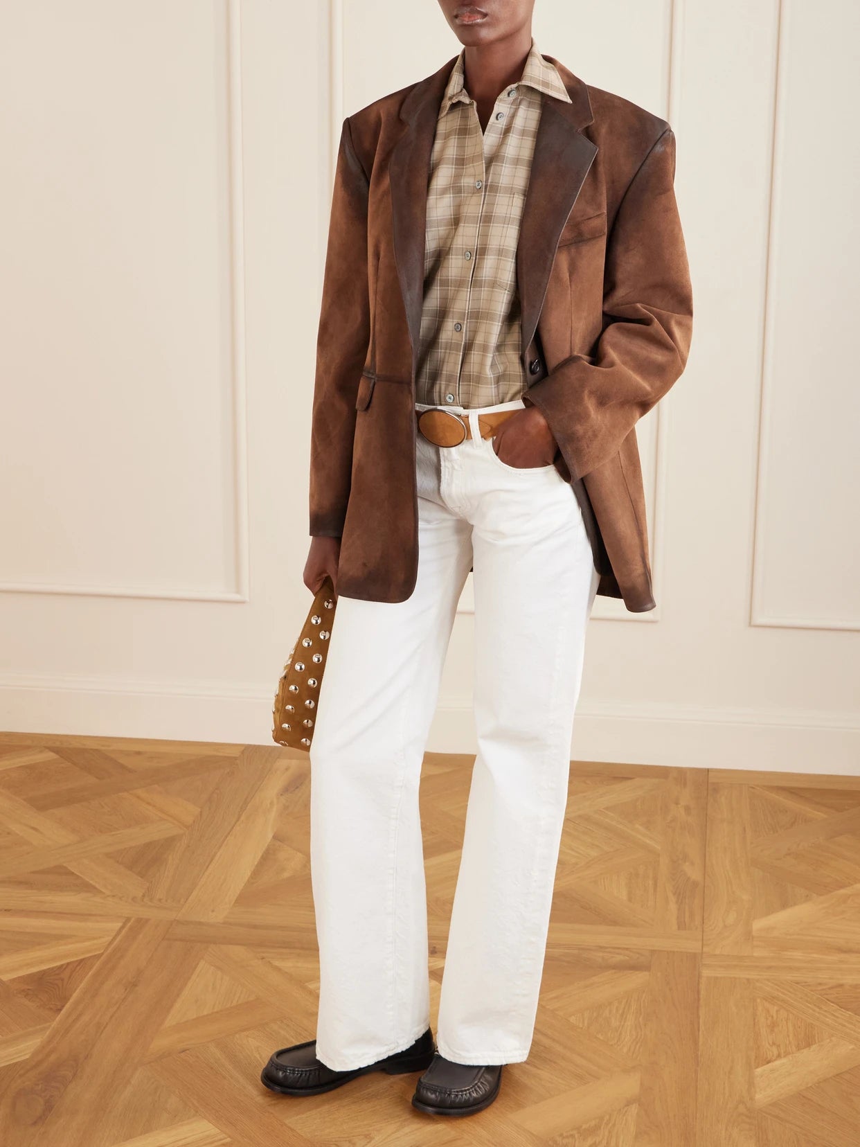 Image of a model wearing Tops. Product name - Sinora Sleeveless Checked Wool Shirt in Multi colour by brand - Acne Studios