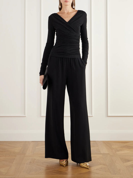 Image of a model wearing Tops. Product name - Ruched Stretch-knit Blouse in Black colour by brand - Dolce & Gabbana