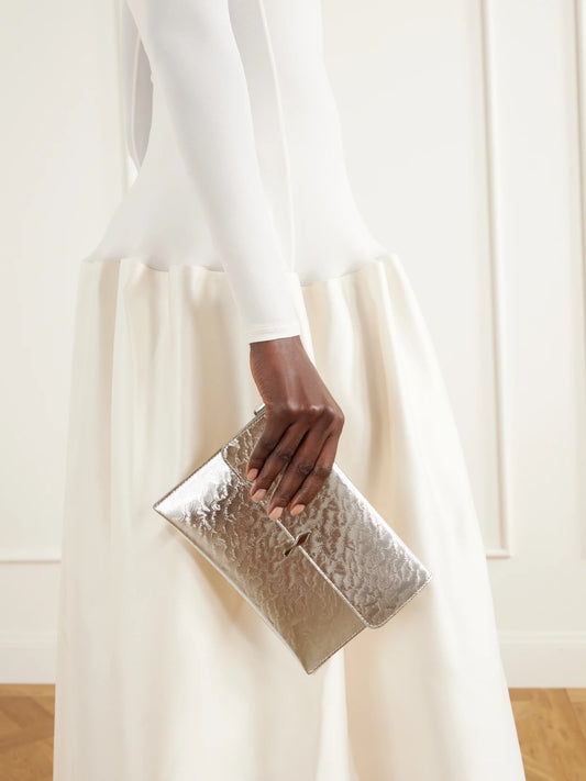 Image of Bags. Product name - Bettina Metallic Leather Pouch in Silver colour by brand - Christian Louboutin