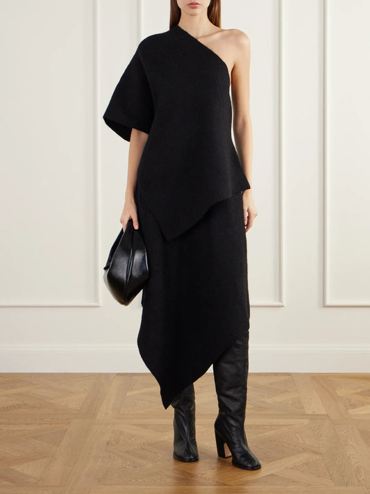 Image of a model wearing Skirts. Product name - Manta Asymmetric Wool, Alpaca And Cotton-blend Felt Midi Skirt in Black, Brown colour by brand - Lauren Manoogian