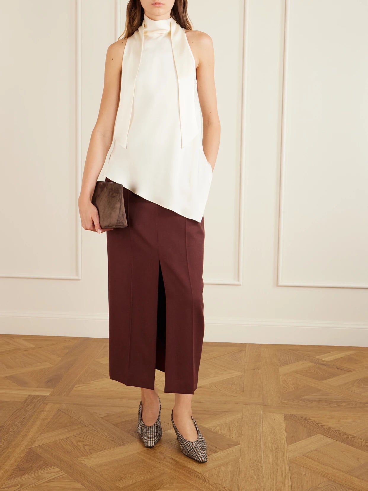 Image of a model wearing Tops. Product name - Scarf-detailed Silk-satin Turtleneck Blouse in White colour by brand - Brunello Cucinelli