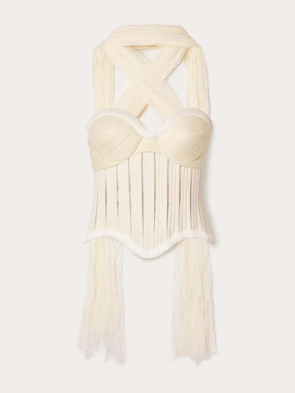 Image of a model wearing Tops. Product name - Anika Strapless Cotton-blend Twill, Tulle And Plissé-satin Bustier Top in White colour by brand - Danielle Frankel