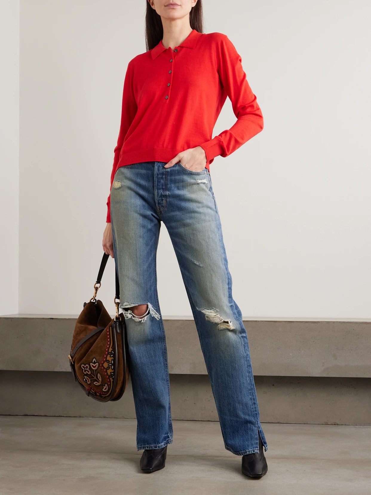 Image of a model wearing Outerwear. Product name - Dea Embroidered Merino Wool Polo Sweater in x small colour by brand - RÙADH