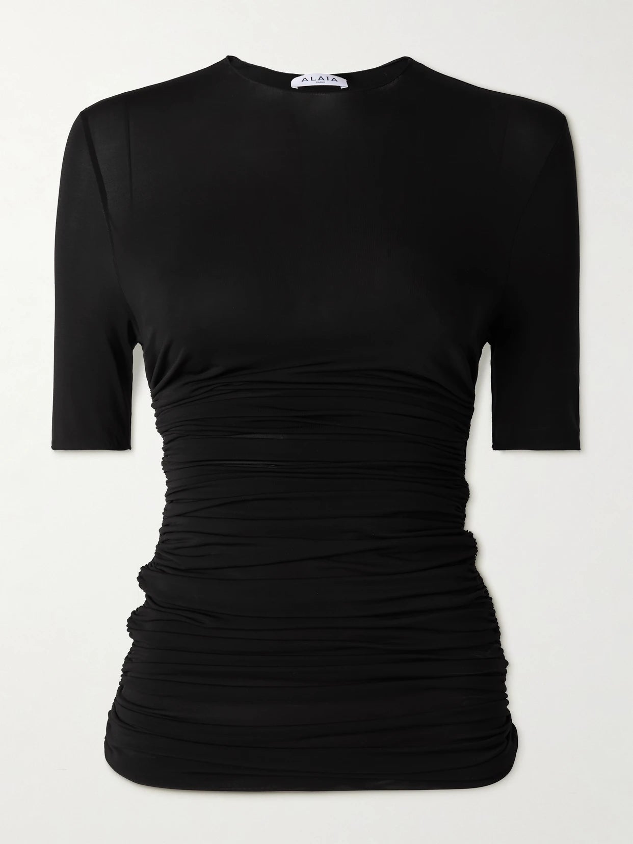 Image of a model wearing Tops. Product name - Ruched Stretch-jersey T-shirt in Black colour by brand - Alaïa