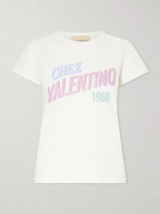 Image of a model wearing Tops. Product name - Printed Cotton Jersey T-shirt in White colour by brand - Valentino Garavani