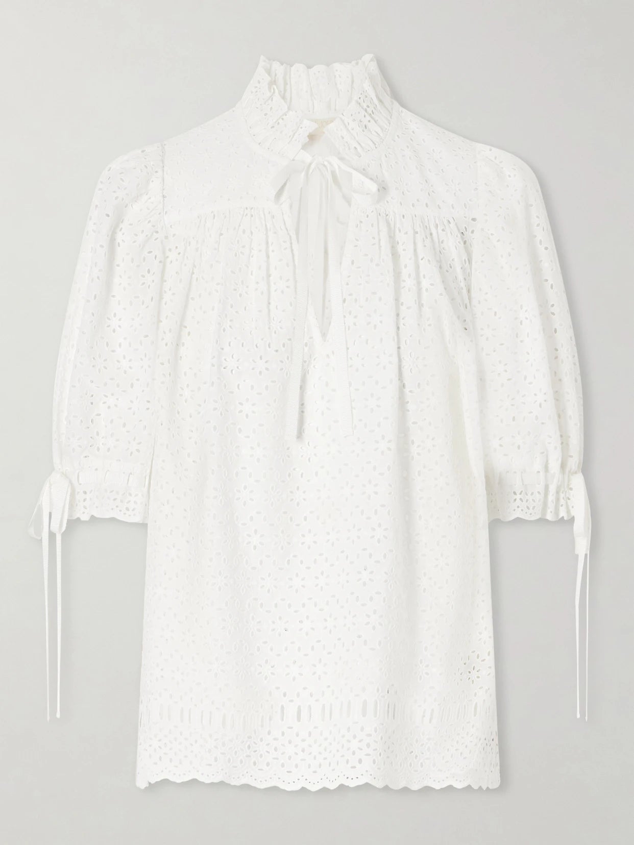 Image of a model wearing Tops. Product name - Alouette Cotton-blend Broderie Anglaise Shirt in White colour by brand - Ulla Johnson