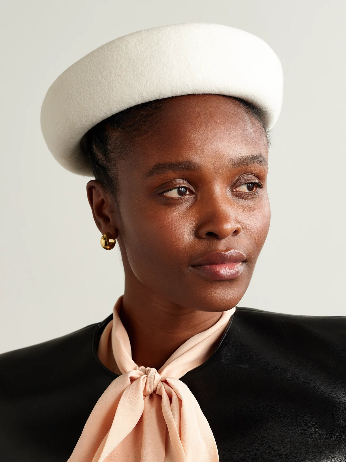 Image of Hats. Product name - Laura Wool-felt Pillbox Hat in Ivory colour by brand - Gigi Burris