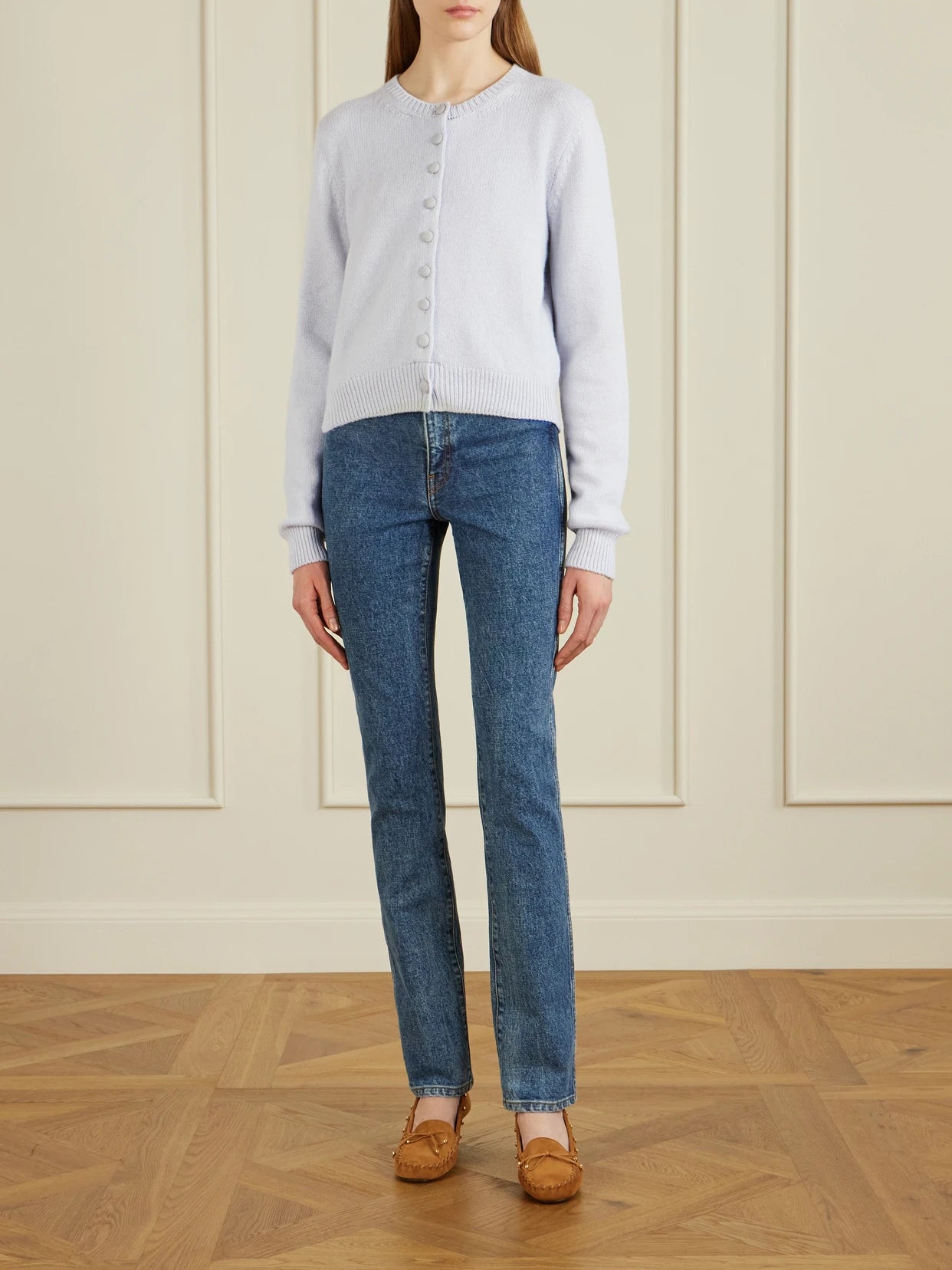 Image of a model wearing Outerwear. Product name - Everheart Cashmere Cardigan in Light blue colour by brand - KHAITE