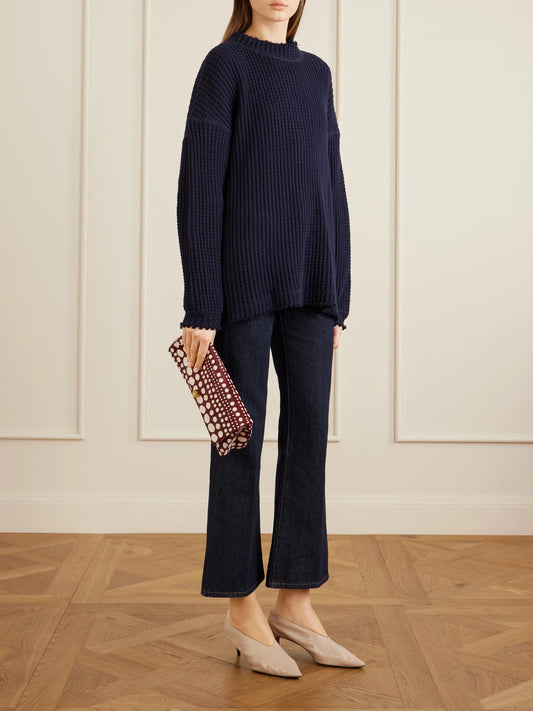 Image of Jeans. Product name - Clara Mid-rise Flared-leg Jeans in Indigo colour by brand - KHAITE