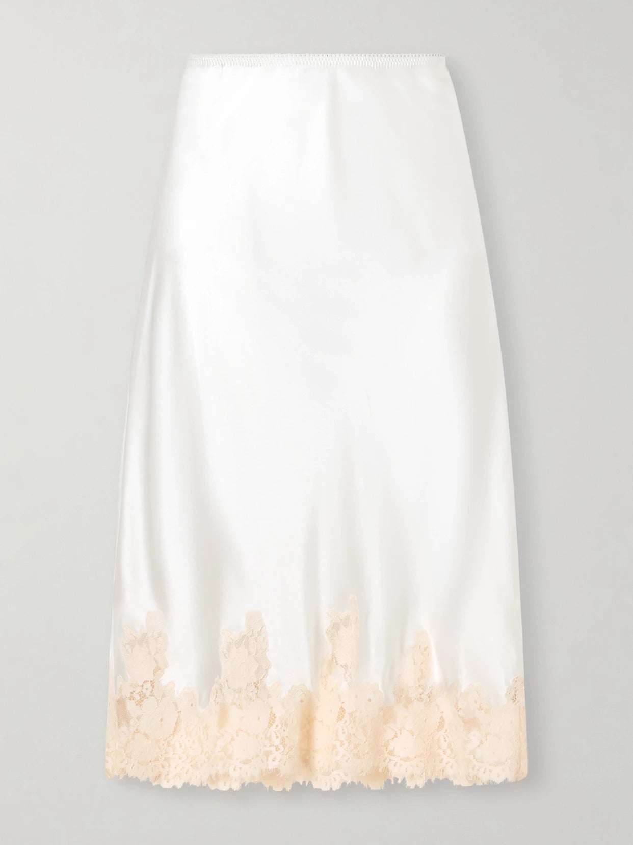 Image of a model wearing Skirts. Product name - Elowette Lace-trimmed Silk-satin Midi Skirt in White colour by brand - DÔEN