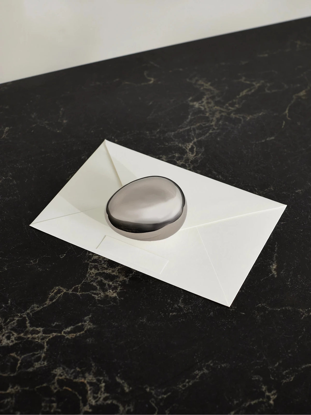 Image of Decor. Product name - Egg Steel Paperweight in Silver colour by brand - Fourth Street
