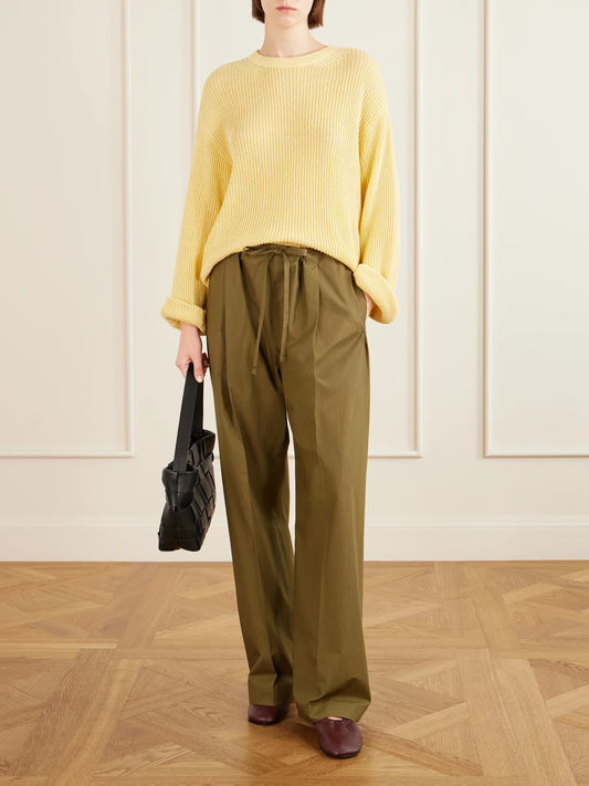 Image of a model wearing Outerwear. Product name - Cotton And Linen-blend Sweater in Yellow colour by brand - Another Tomorrow