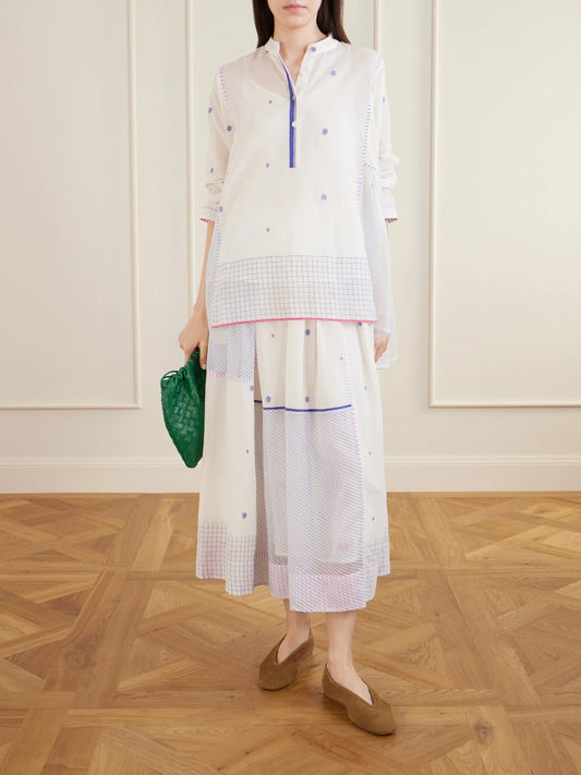 Image of a model wearing Tops. Product name - Cosmos Handwoven Cotton-jamdani Blouse Patched With Printed Stripes in Off-white colour by brand - Eka