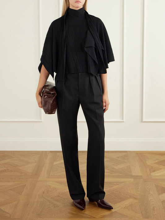 Image of a model wearing Tops. Product name - Cape-effect Tie-detailed Gauze Blouse in Black colour by brand - Tibi