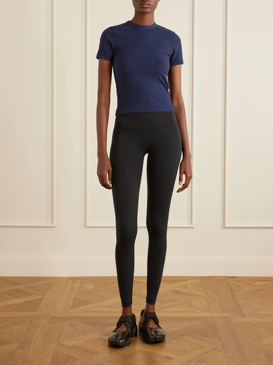 Image of a model wearing Tops. Product name - All-day Rib Lyocell And Cotton-blend T-shirt in Navy colour by brand - ON