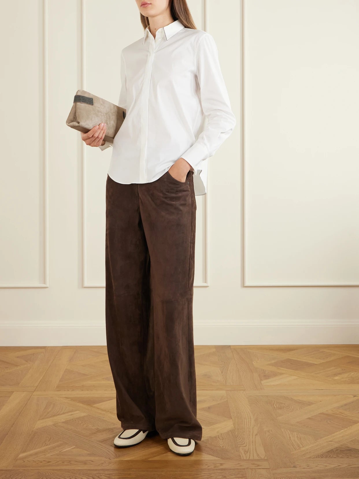 Image of a model wearing Tops. Product name - Embellished Cotton-blend Shirt in White colour by brand - Brunello Cucinelli
