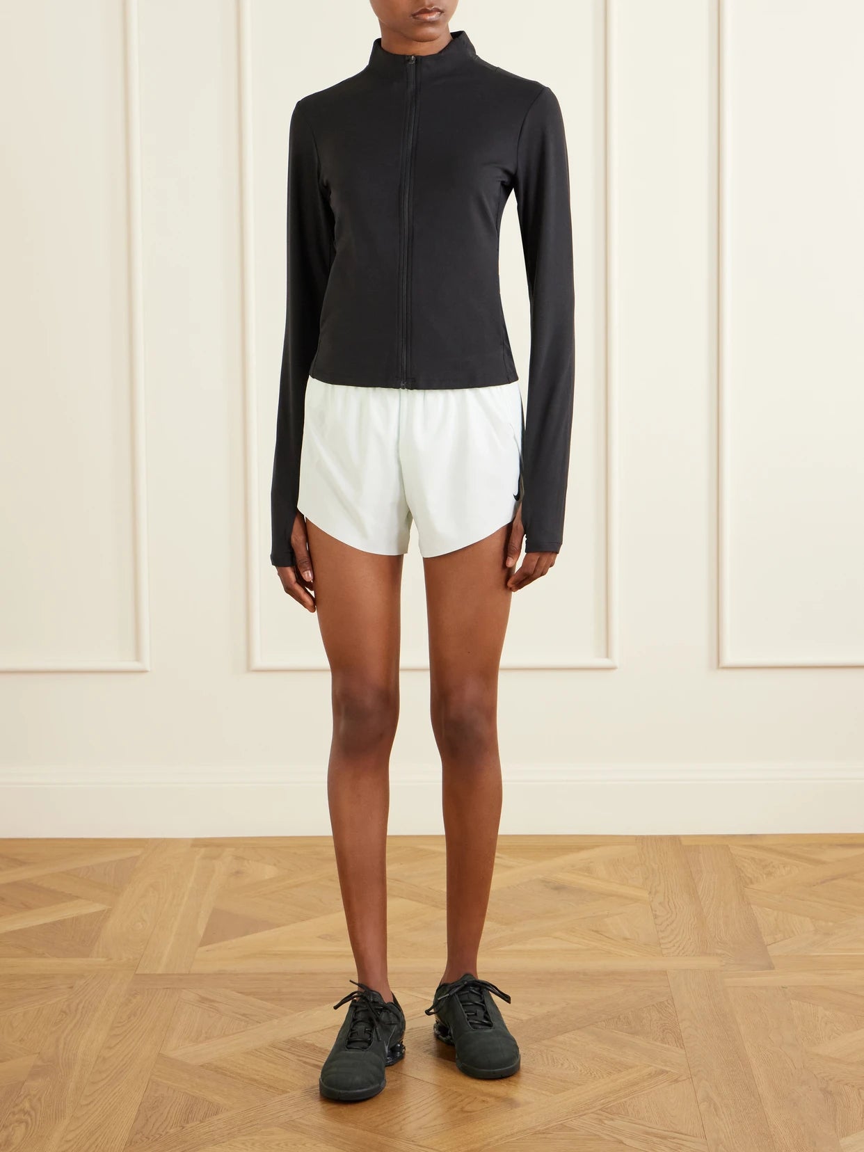 Image of Coats & Jackets. Product name - Zenvy Dri-fit Infinasoft Jacket in Black colour by brand - Nike