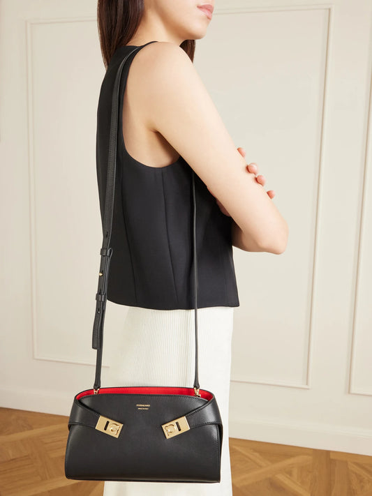 Image of Bags. Product name - Hug Embellished Textured-leather Shoulder Bag in Black colour by brand - Ferragamo