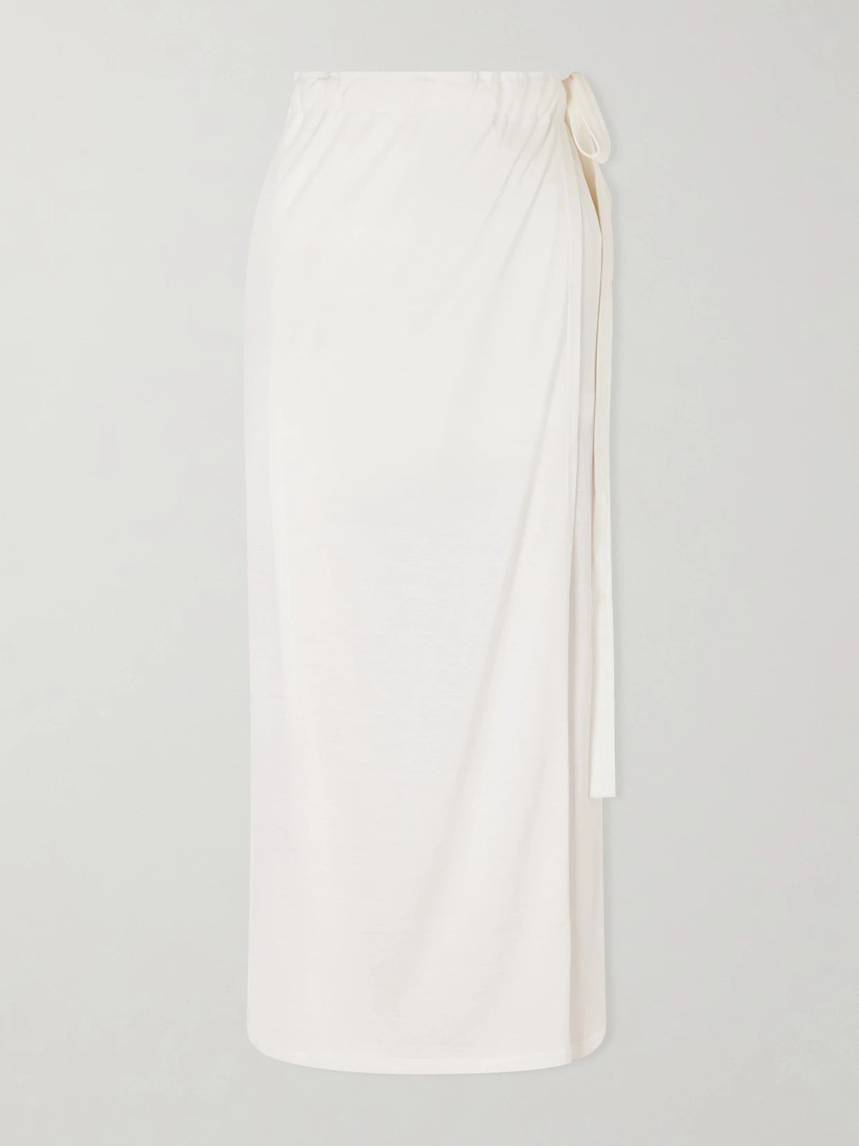 Image of a model wearing Skirts. Product name - Silk And Cotton-blend Wrap Midi Skirt in Off-white colour by brand - TOTEME