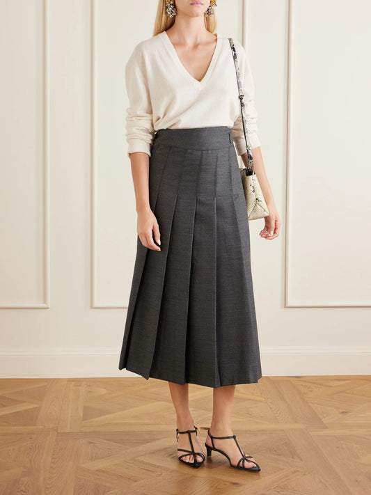 Image of a model wearing Skirts. Product name - Pleated Wool-blend Midi Skirt in Gray colour by brand - RÓHE