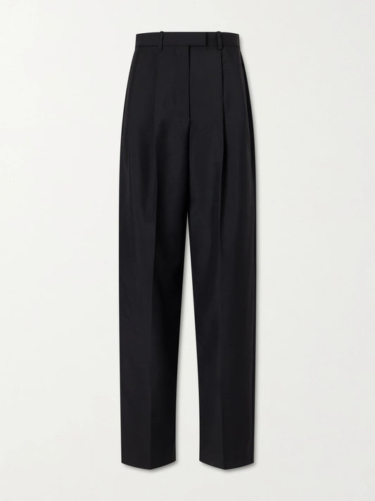 Image of a model wearing Pants. Product name - Pleated Wool And Mohair-blend Wide-leg Pants in Black colour by brand - Givenchy