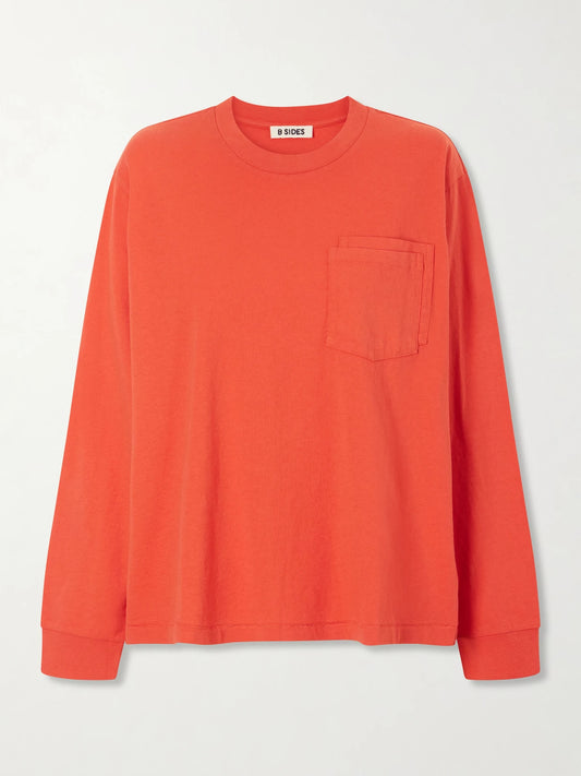 Image of a model wearing Tops. Product name - Double Pocket-detail Cotton T-shirt in Red colour by brand - B SIDES
