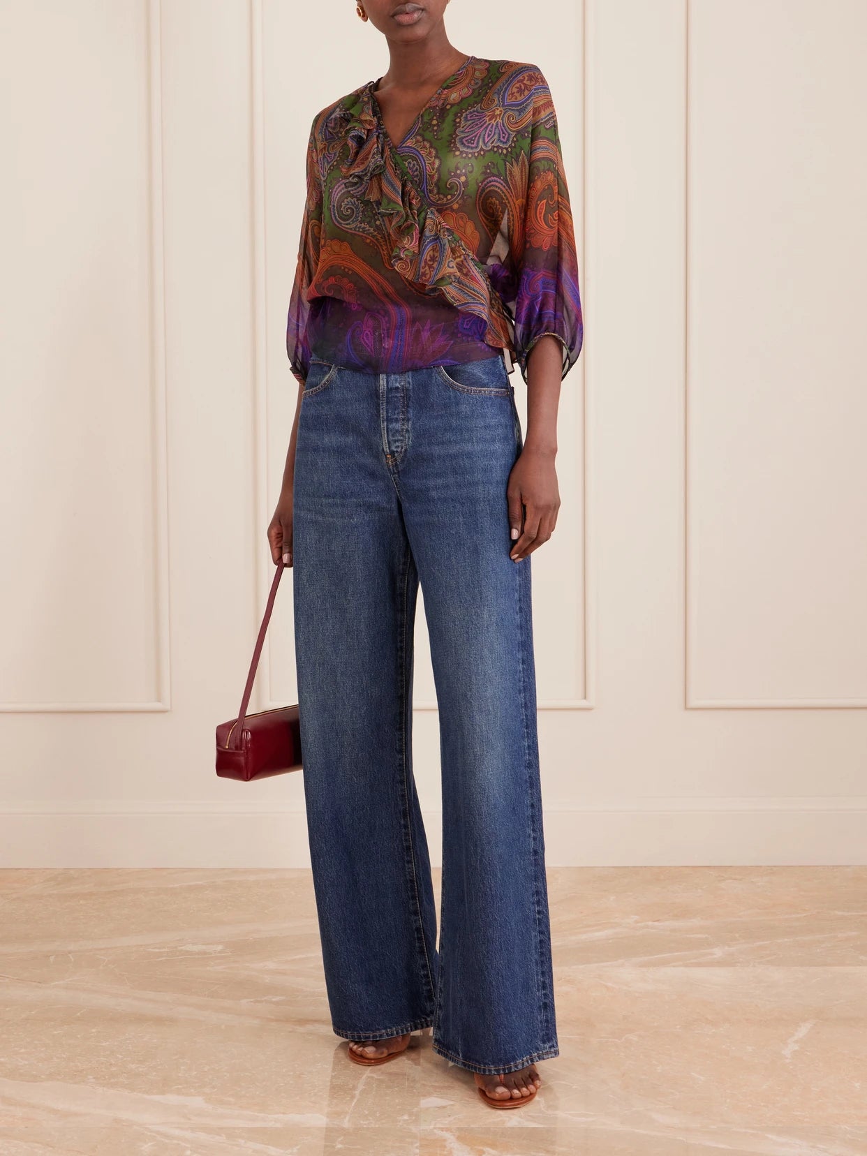 Image of a model wearing Tops. Product name - Paisley-printed Silk Blouse in Dark green colour by brand - Etro